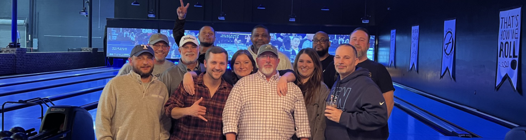The Wyatt Johnson Hyundai team posing at a bowling alley